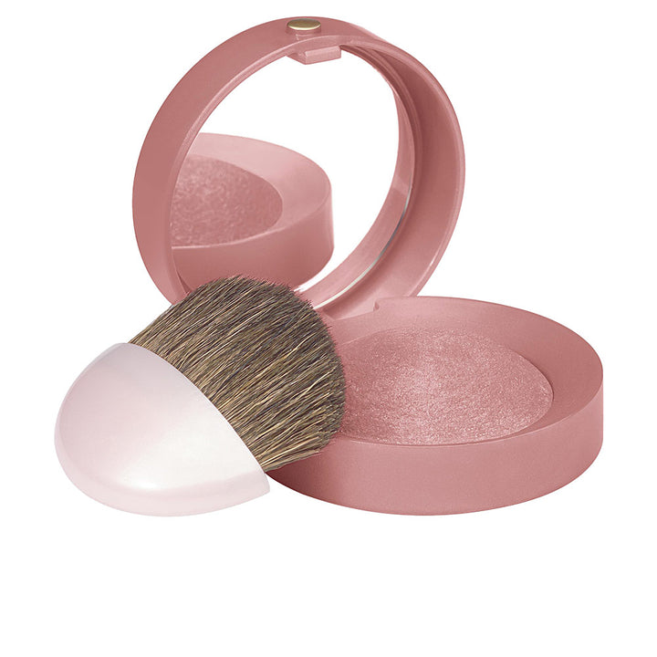 Round baked compact blush in rose-amber shade with mirror and small brush