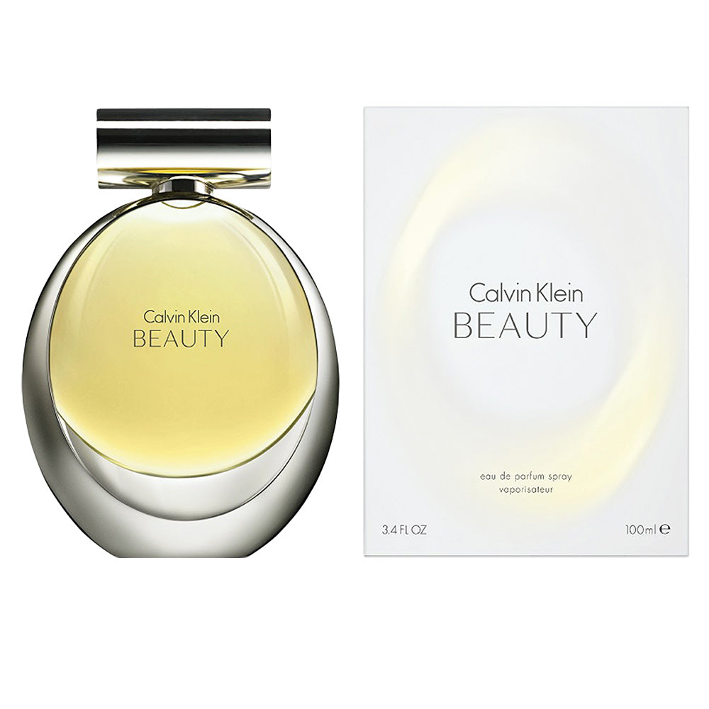 Clear glass 100 ml perfume bottle with floral fragrance notes of jasmine and cedar for Women
