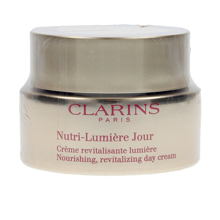 50 ml jar of nourishing, oil‑texture day cream for women, luminous cream surface