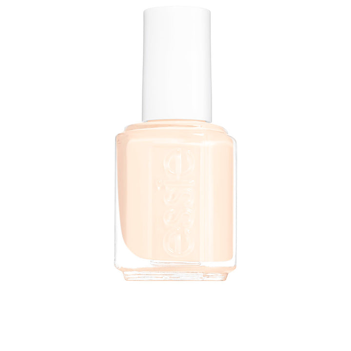 Bottle of creme nail polish in soft red, 13.5 ml, with ergonomic brush