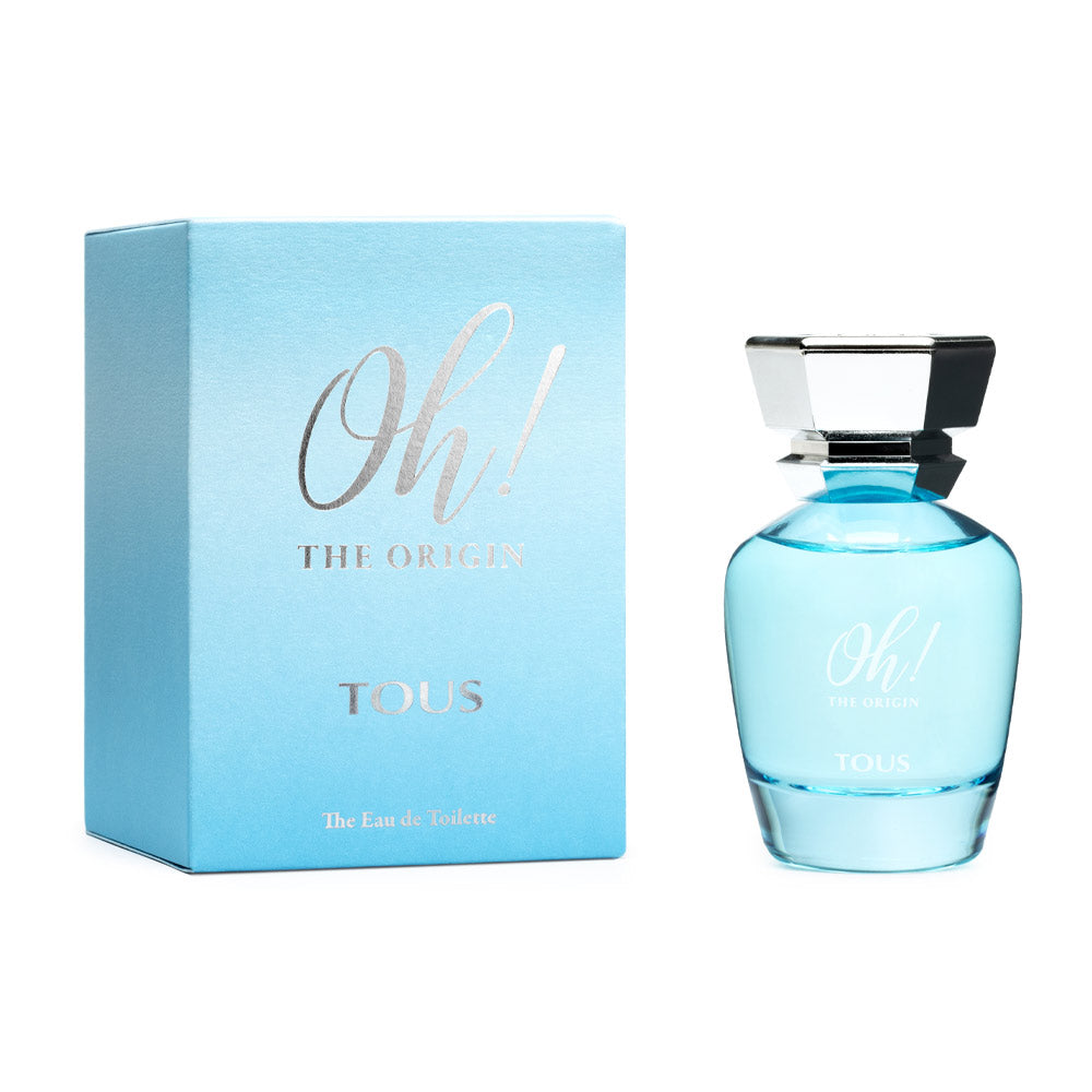 Tall glass 100 ml woody-floral eau de toilette bottle with warm amber liquid