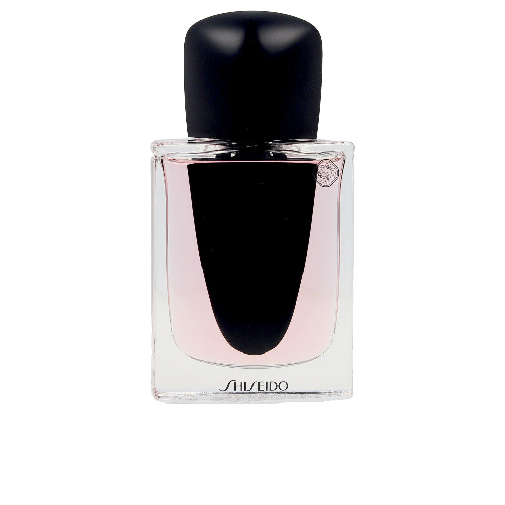 30 ml sculpted perfume bottle; floral‑woody scent for Women