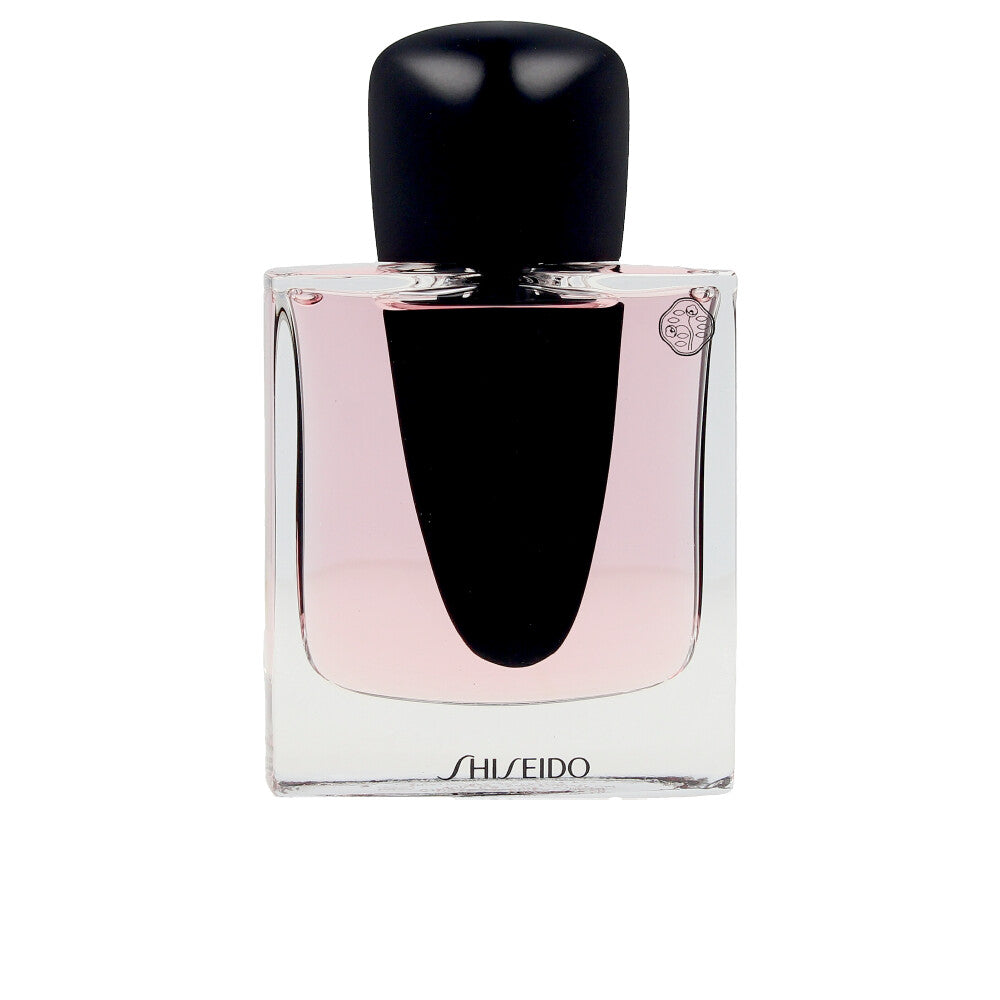 30 ml sculpted perfume bottle; floral‑woody scent for Women