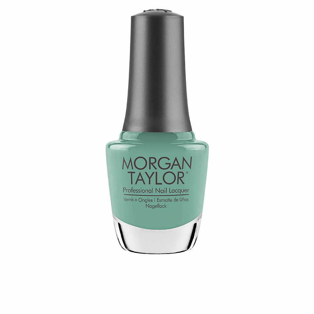 15 ml glass bottle of creme nail lacquer in coral‑pink shade, curved brush detail