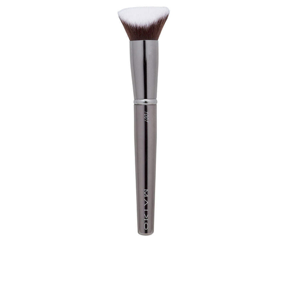 Angled grey synthetic foundation brush with dense tapered head, compact size