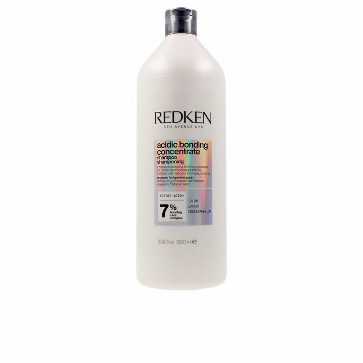 1,000 ml opaque bottle of concentrated bond-repair shampoo for colour-treated hair