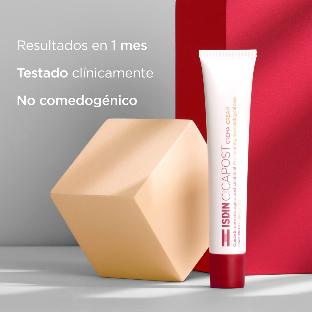 Isdin White cream tube and box with maroon cap, maroon and orange text, minimalist clinical plastic and cardboard