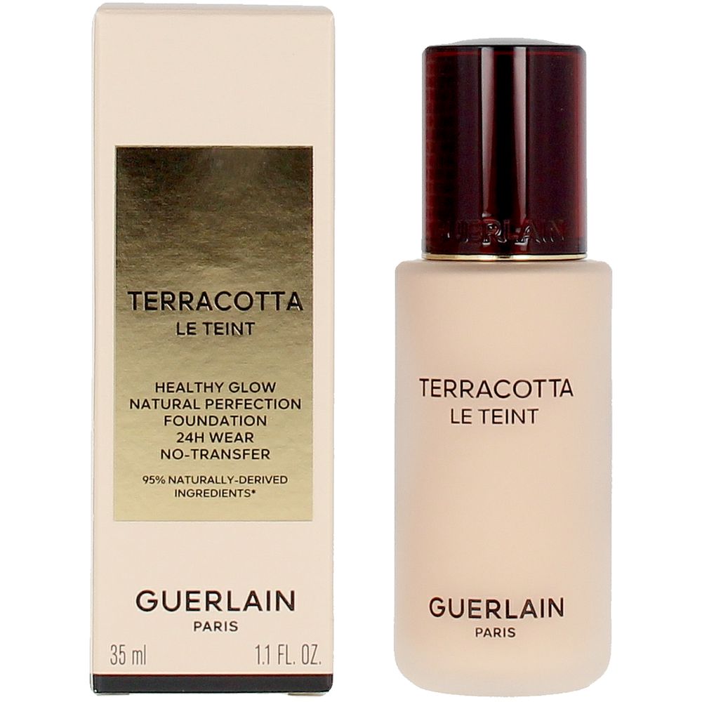 Frosted glass foundation bottle with dark brown embossed cap and gold-label rectangular box, Guerlain