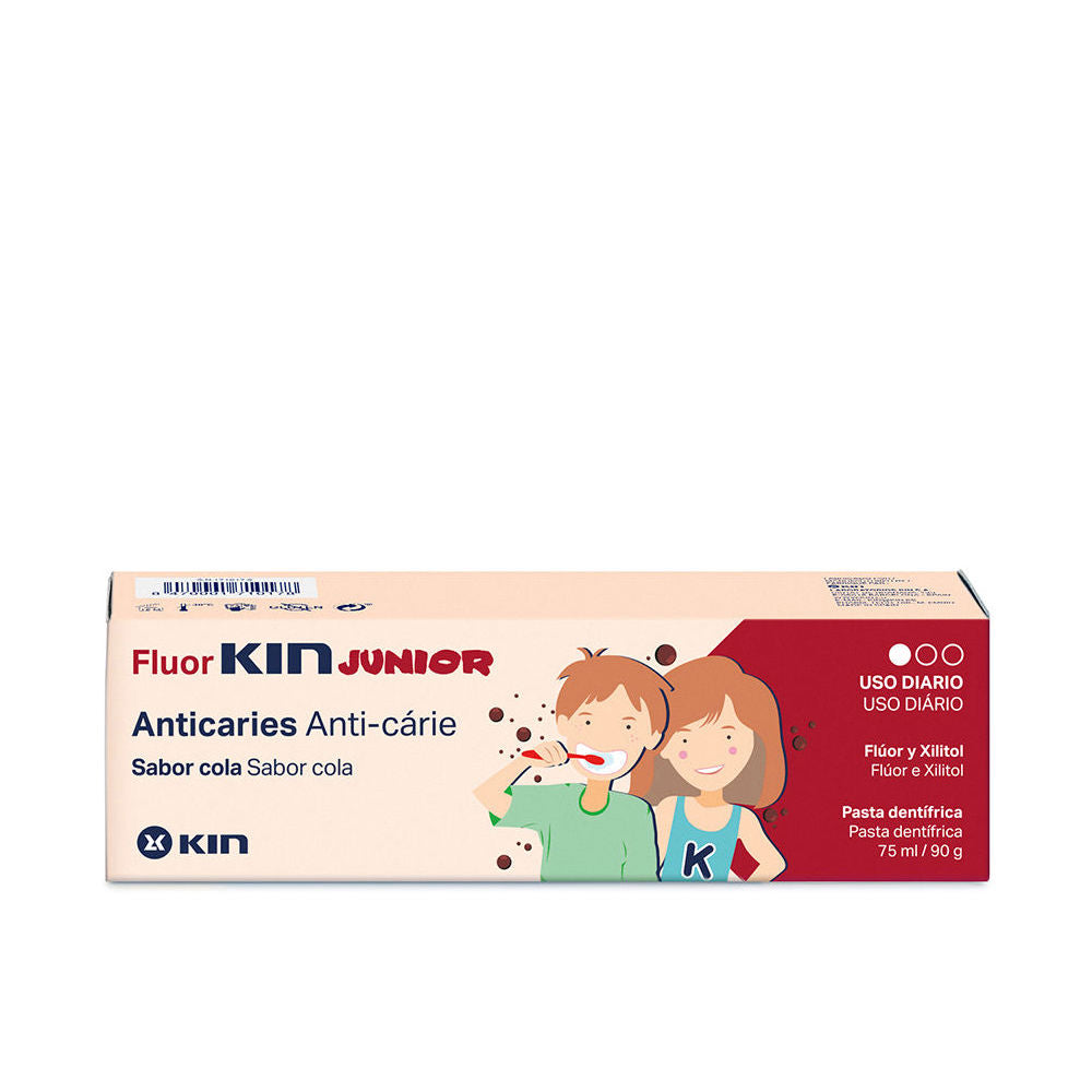Kin Beige toothpaste tube with red, green, blue accents; cartoon children illustration, multilingual text, logo