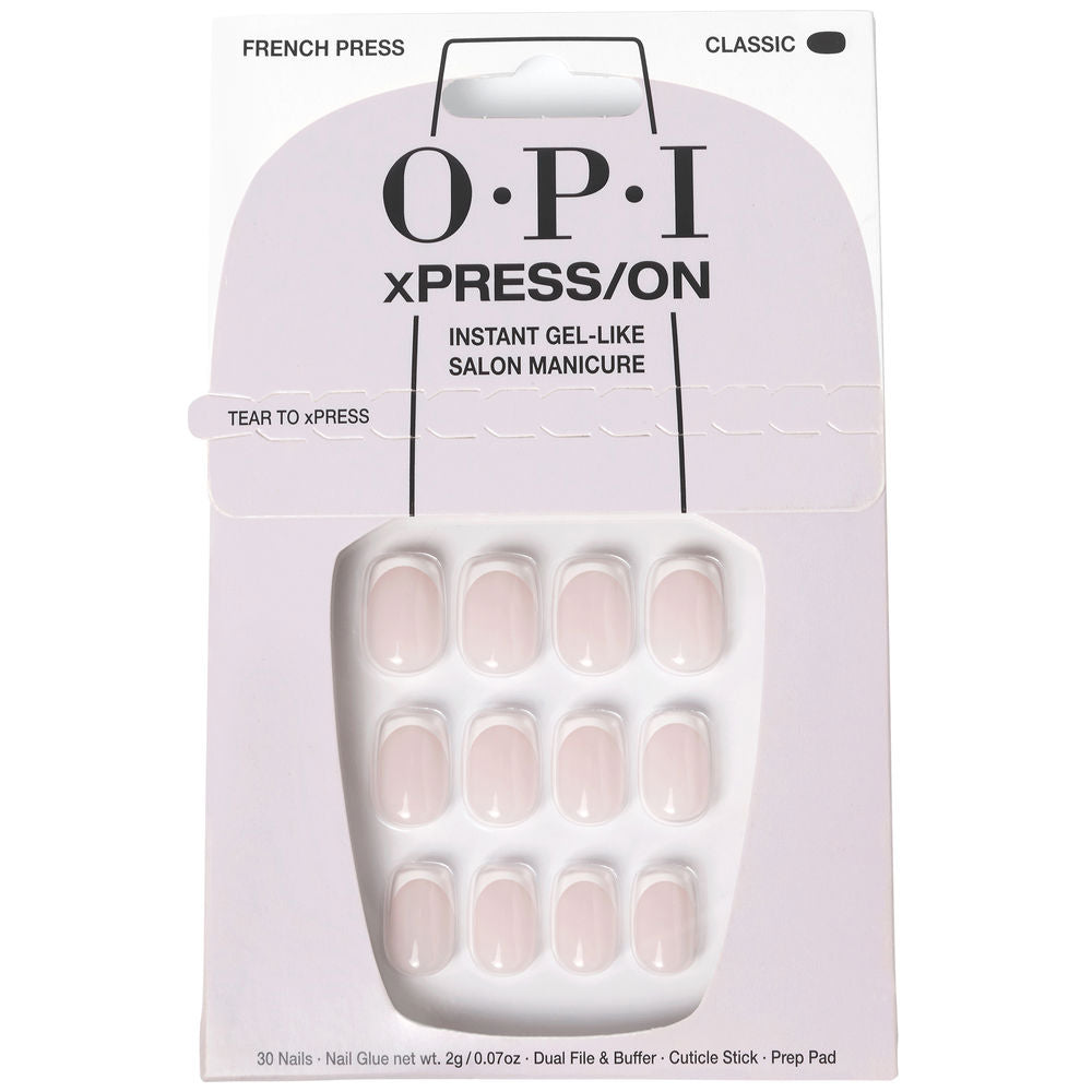 Set of 30 French‑tip press‑on nails with adhesive and manicure tools, packaged