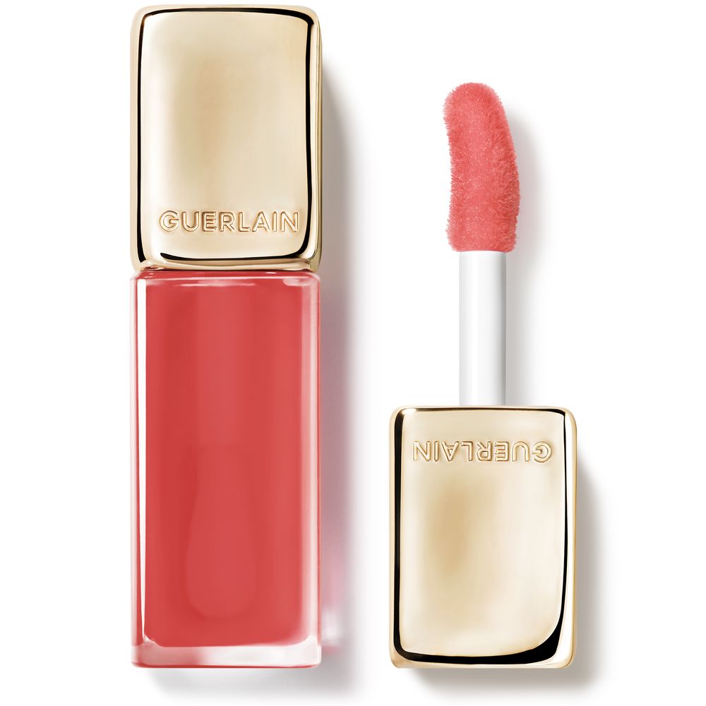 Sheer honey-tinted lip oil in clear tube with applicator, 9.5 ml