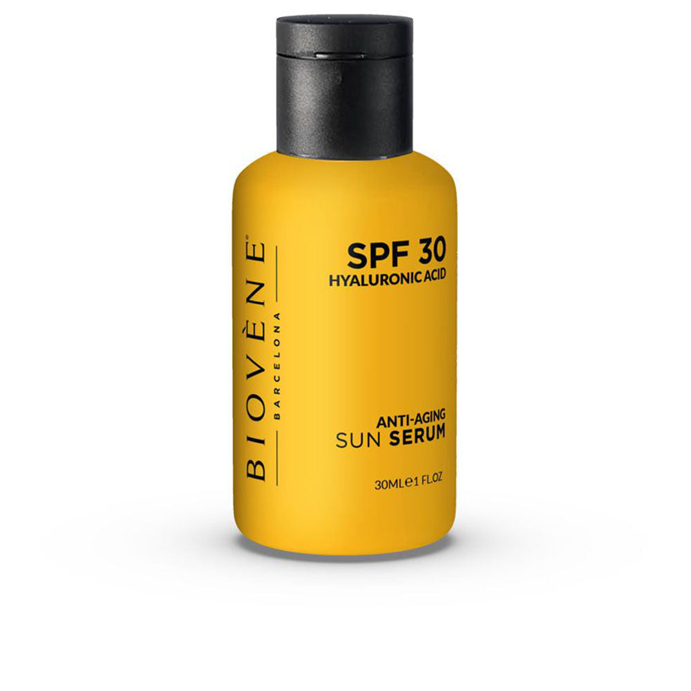 Biovène Slim yellow cylindrical sun serum bottle with black cap, matte finish and printed text