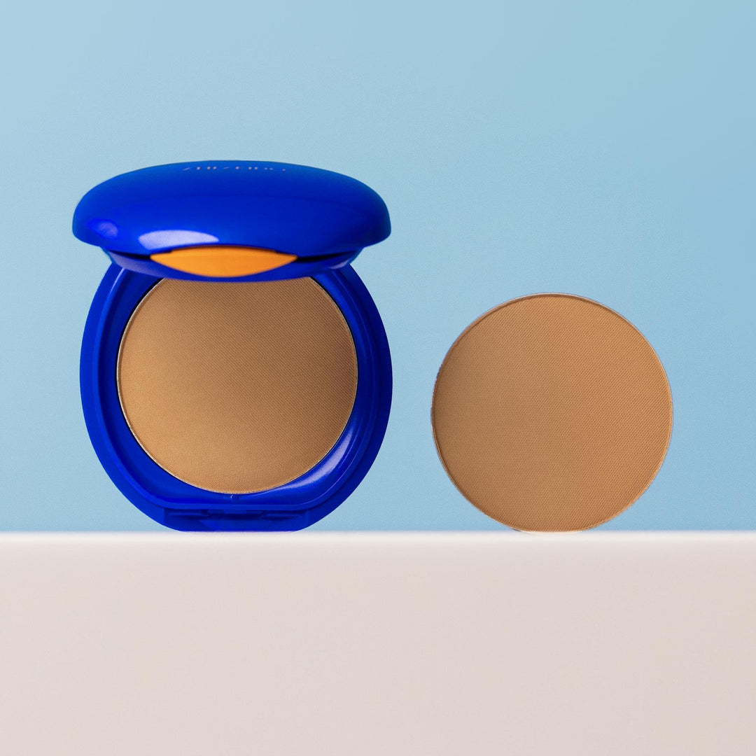 Shiseido Compact foundation case with mirror, refill pan and sponge applicator, matte powder finish