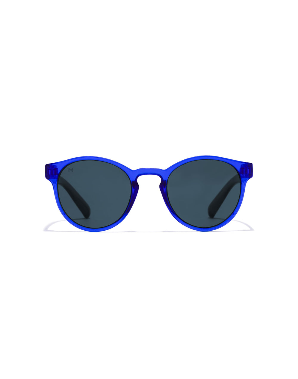 Hawkers round kids sunglasses, transparent blue plastic frame, keyhole bridge, dark round lenses
