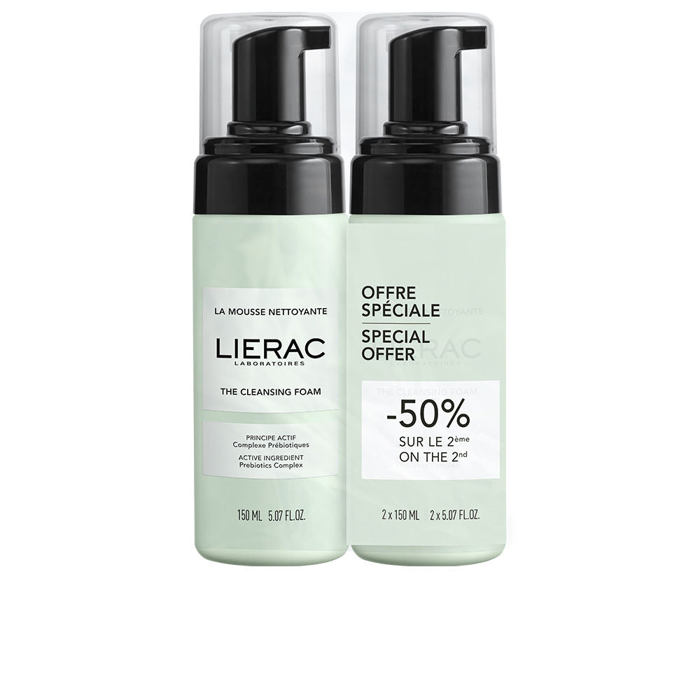 Light green and white plastic dual cleansing foam bottles with pump dispenser and clear caps, printed labels, Lierac.