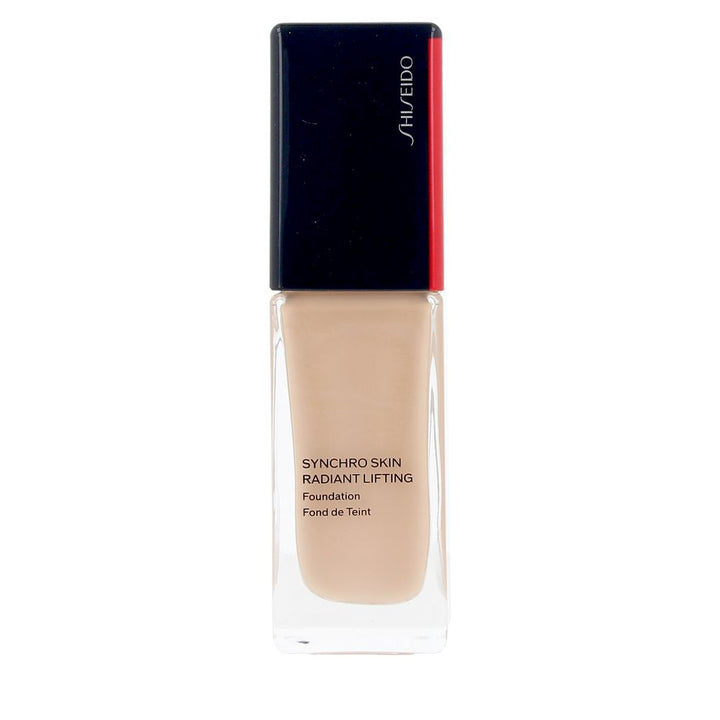 30 ml glass bottle of SPF30 Light‑Adjusting fluid foundation, shade 310