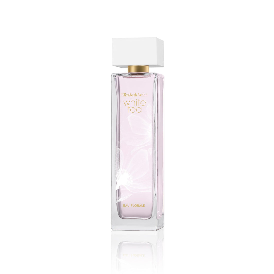 Slim clear bottle with soft pink perfume and gold cap, 100 ml