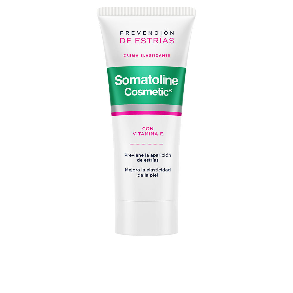 Somatoline White, green, and pink plastic cream tube with screw cap, soft swatch of product beside it on neutral surface
