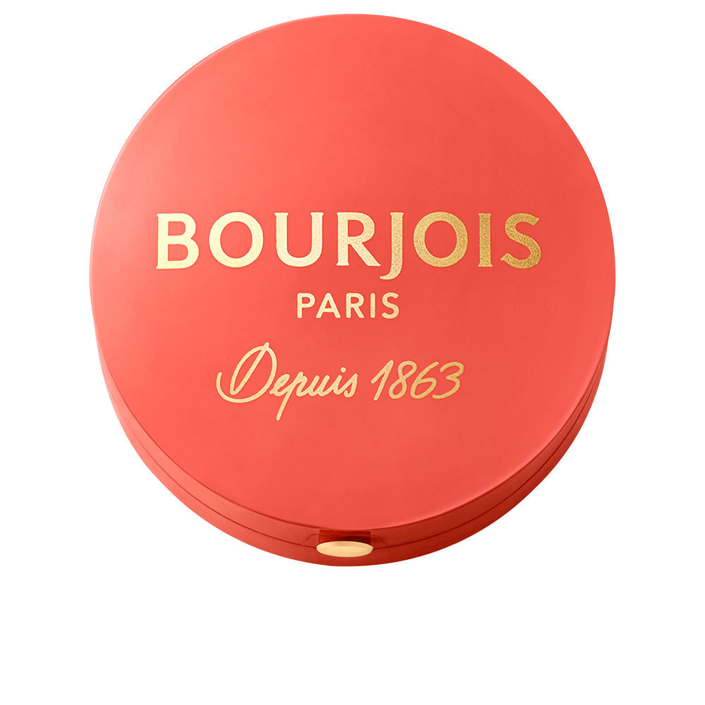 Small round baked blush compact with mirror, brush, orange shade