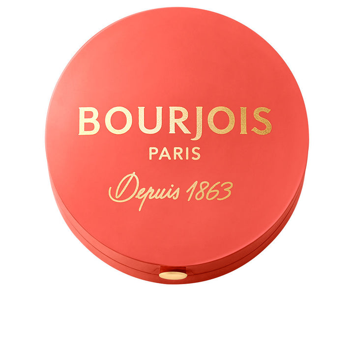 Small round baked blush compact with mirror, brush, orange shade