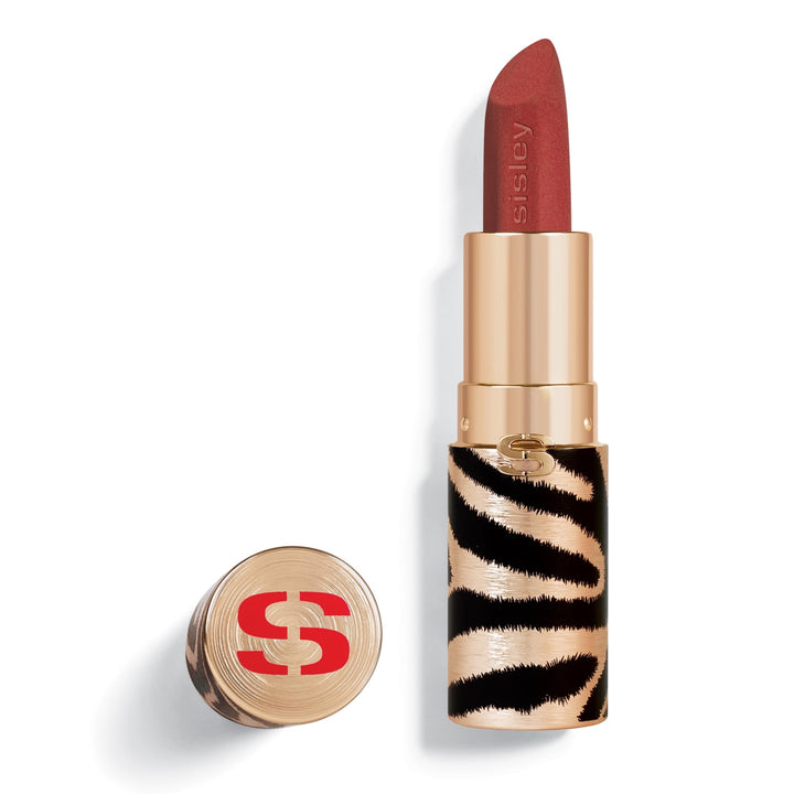 Refillable velvet-matte lipstick in orange shade, gold-matte case, faceted bullet
