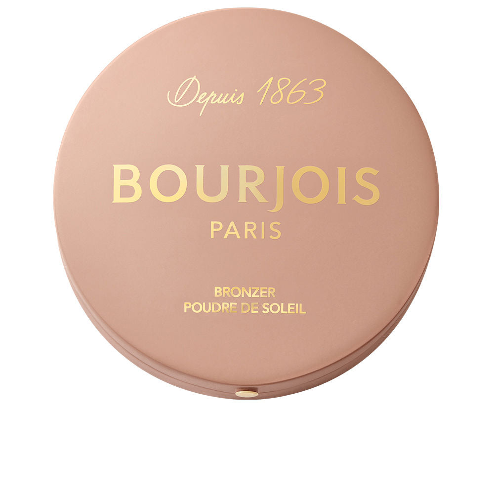 Bourjois Compact round plastic bronzer case in light tan with warm baked powder, gold text and button clasp