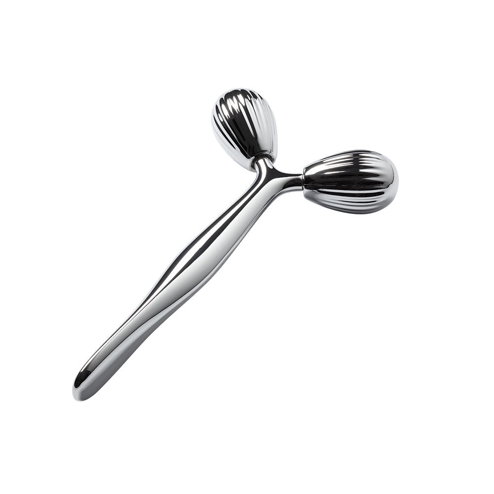 Payot dual-ended facial roller for contouring, de-puffing, and enhanced product absorption.