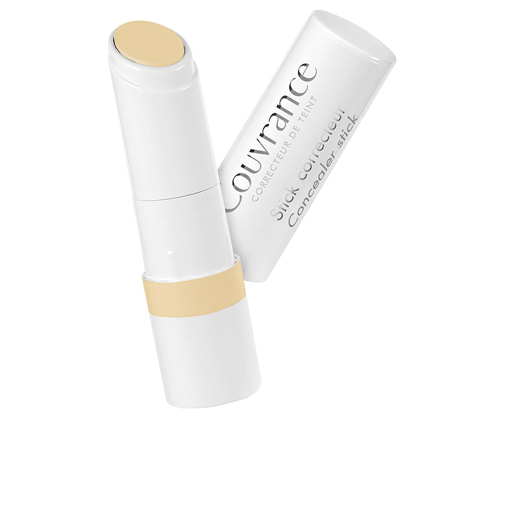 Avène white and beige plastic twist-up concealer stick with removable cap and printed text on cap