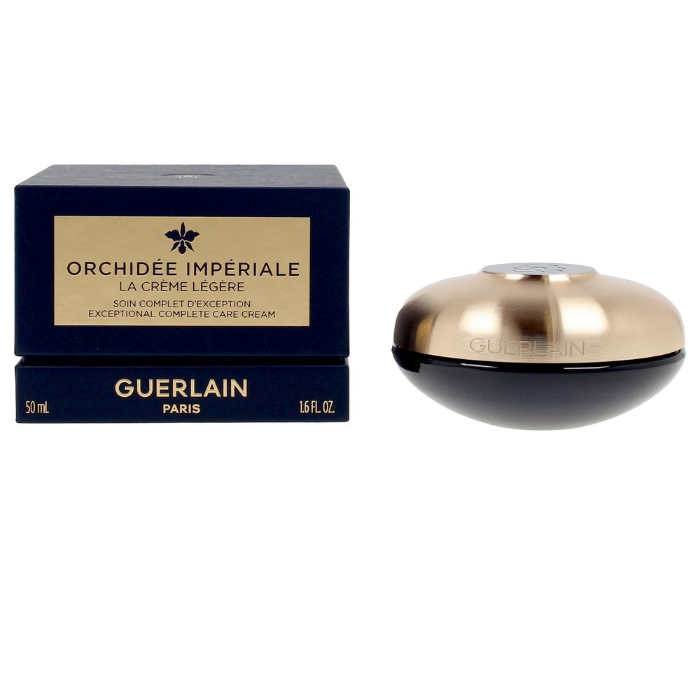 Navy blue and gold boxed cream with round jar and lid, paper box and glass jar — Guerlain