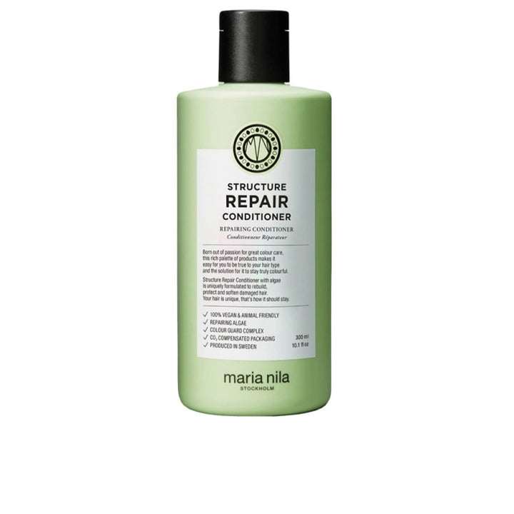 300 ml pale-cream conditioner tube labelled Repairing Algae Structure Repair, Unisex