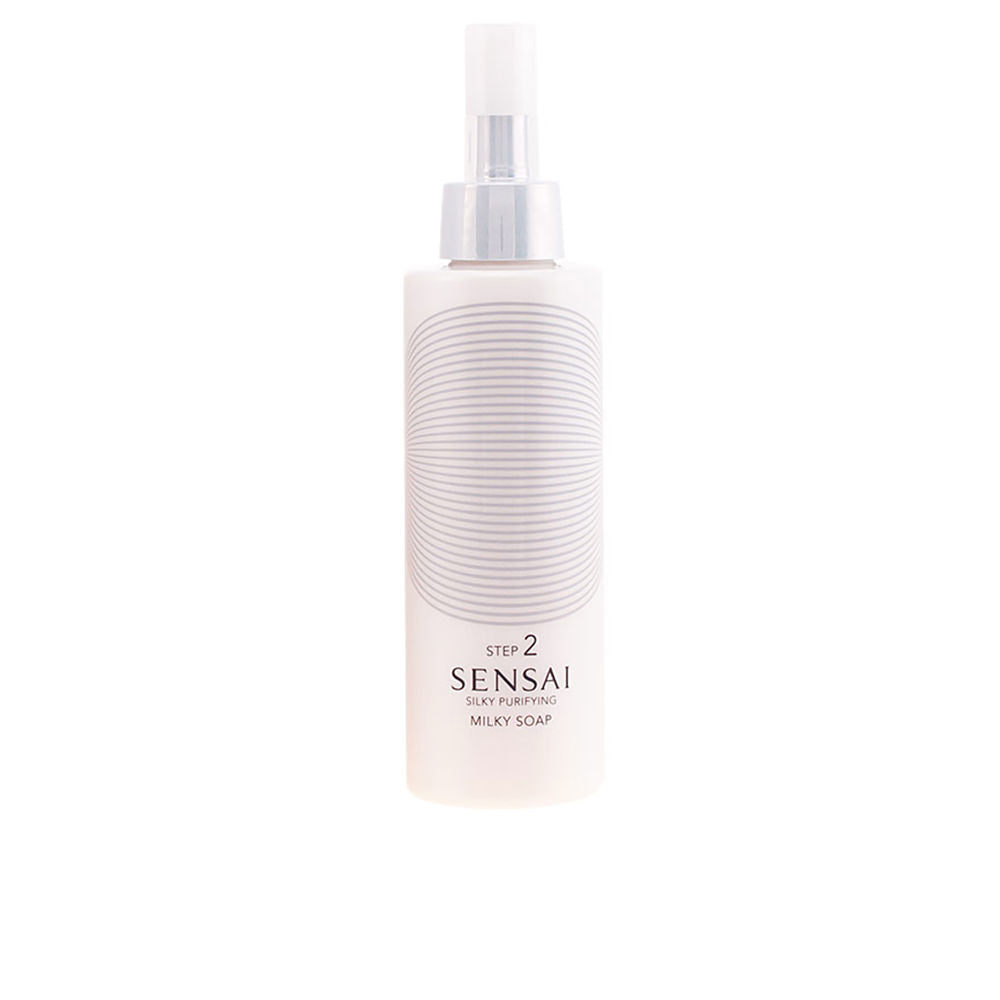 Sensai White plastic bottle with spray pump and horizontal line pattern, minimalist design, photographed on white background