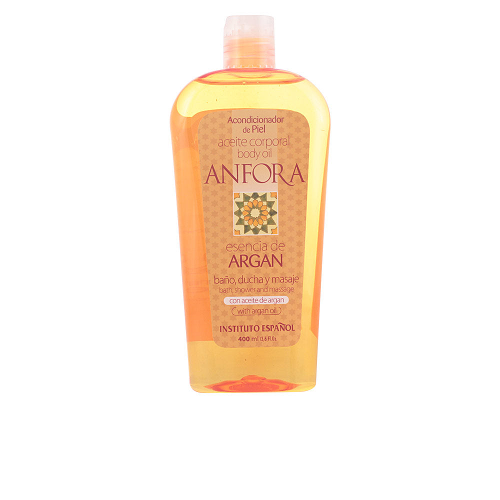 Instituto Español Transparent orange plastic body oil bottle with flip-top cap, simple functional label and golden liquid