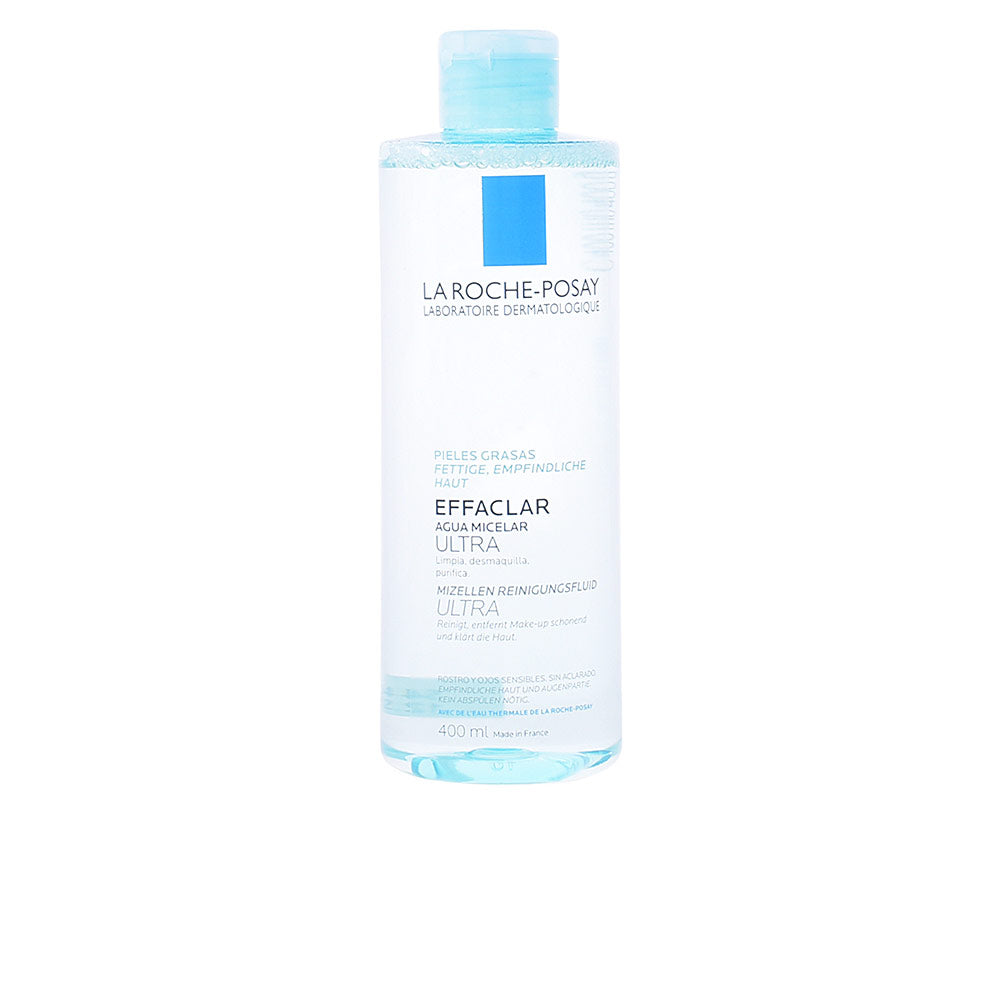 Light blue and white minimalist plastic micellar water bottle with flip cap and transparent body, la Roche Posay