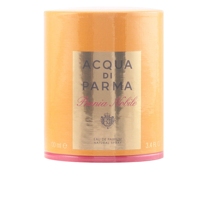 Clear crystal 50 ml perfume bottle with rose-pink liquid and rose-gold cap