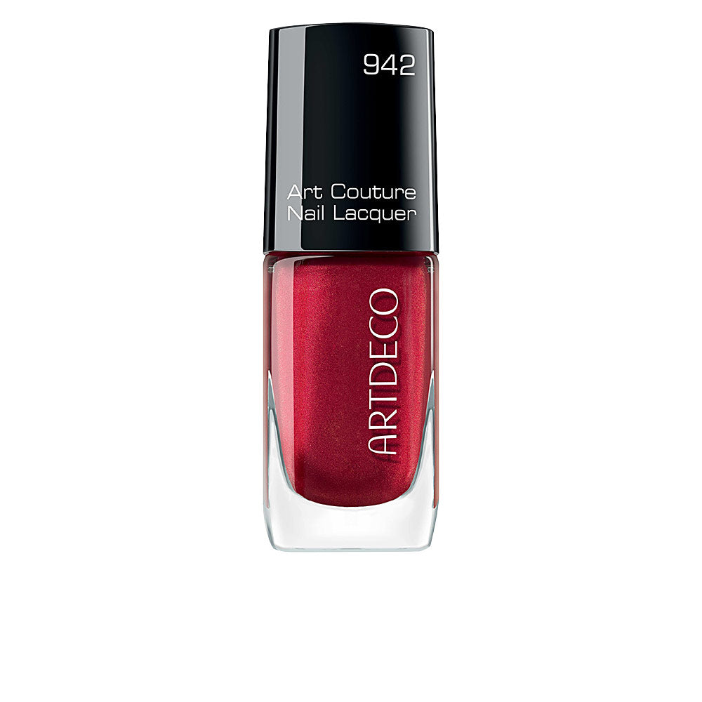 Small glass bottle of Venetian red nail lacquer with tapered brush, 10 ml