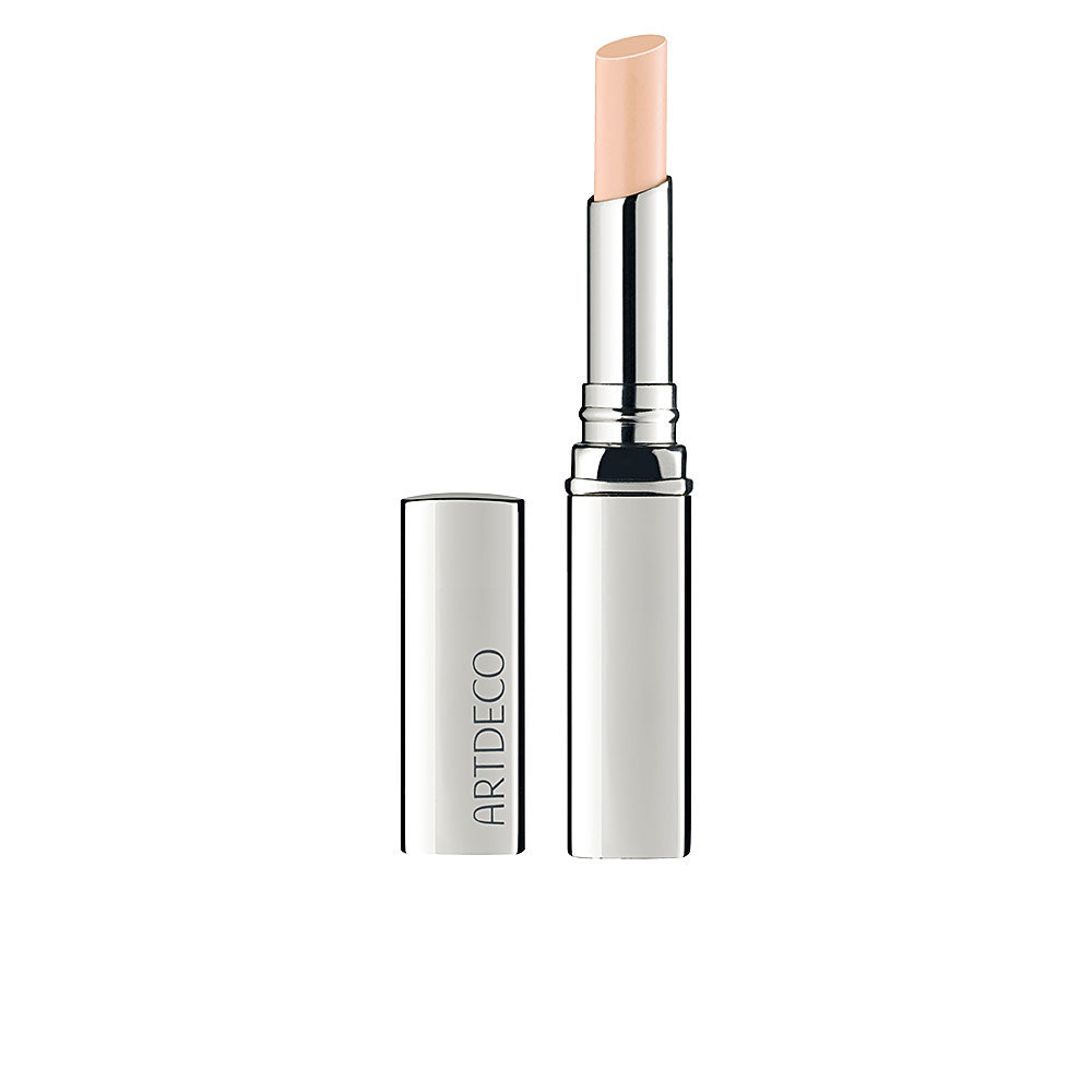 Artdeco Beige twist-up concealer stick in silver cylindrical tube with removable cap and metallic finish