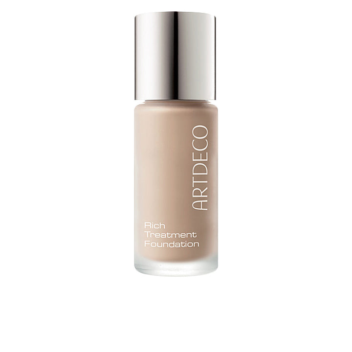 Artdeco Beige liquid foundation in frosted glass cylindrical bottle with metallic cap and vertical text