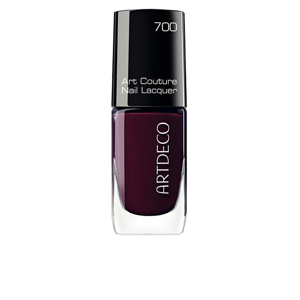 10 ml bottle of deep pink-mauve nail lacquer with wide application brush