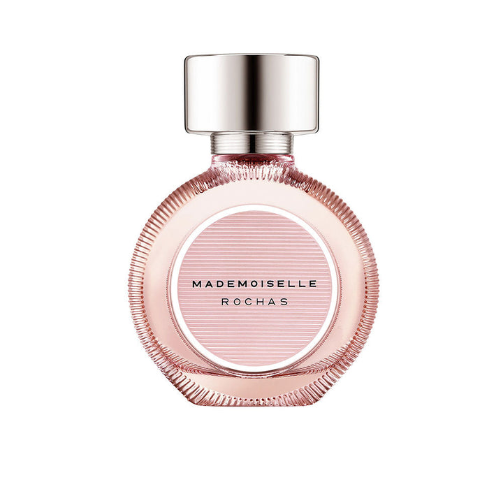 Rochas Glass round pink perfume bottle with metallic cap and white ribbon bow, elegant modern design