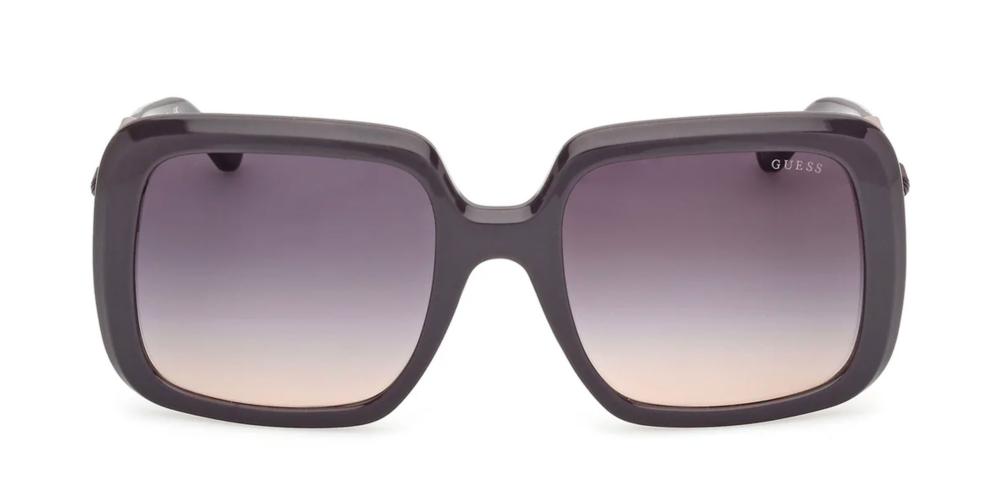Dark purple oversized square sunglasses with gradient lenses and gold chain-link detail on temples