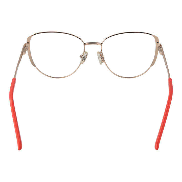 Gold metal cat-eye eyeglasses with coral temple tips, thin temples and adjustable nose pads on white background