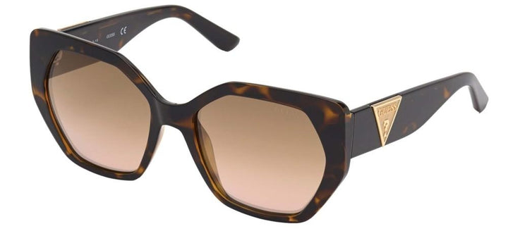 Oversized tortoiseshell hexagonal sunglasses for Women with gradient brown lenses and gold logo on wide arms