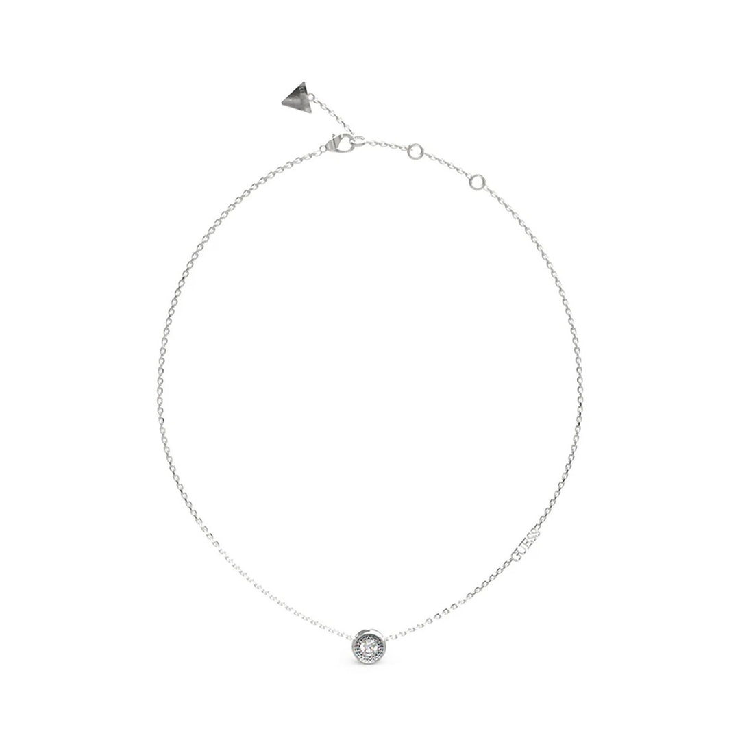 Silver pendant necklace on delicate chain featuring clear round stone and small triangular charm