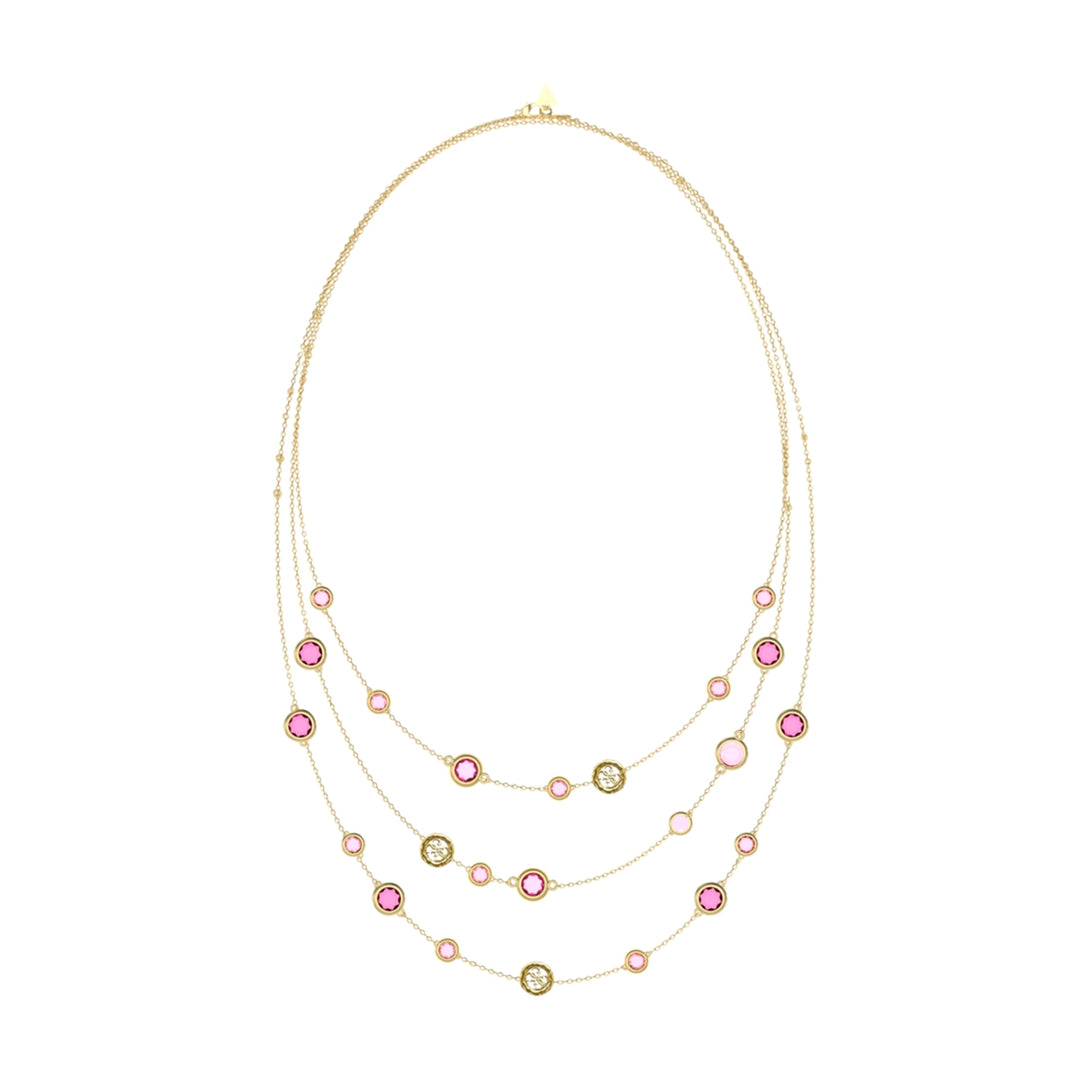 Three-layer gold necklace with round pink gemstones and small gold coin-like charms on a light background