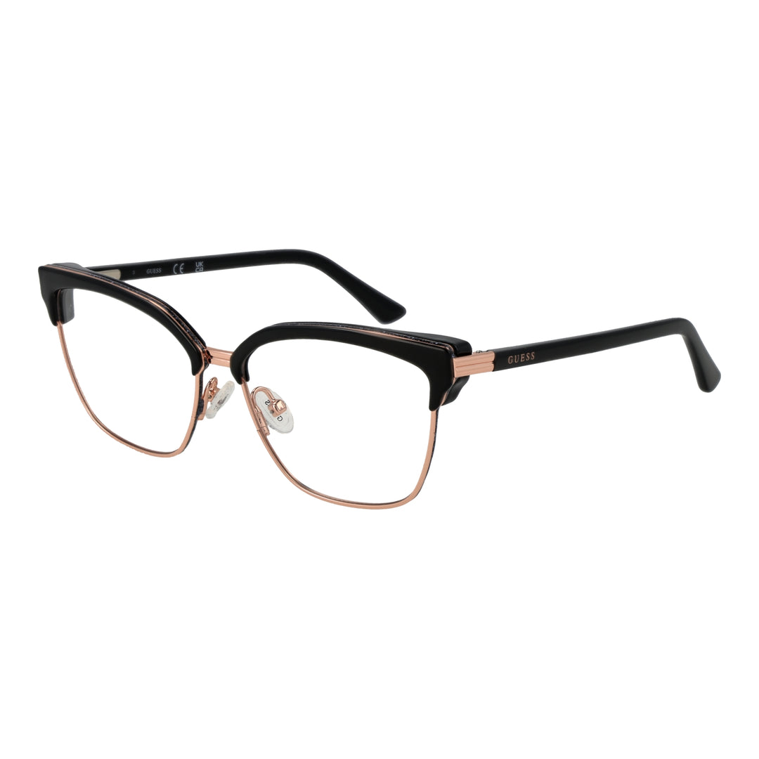 Black metal cat-eye eyeglasses with rose gold accents and plastic temple tips on neutral background