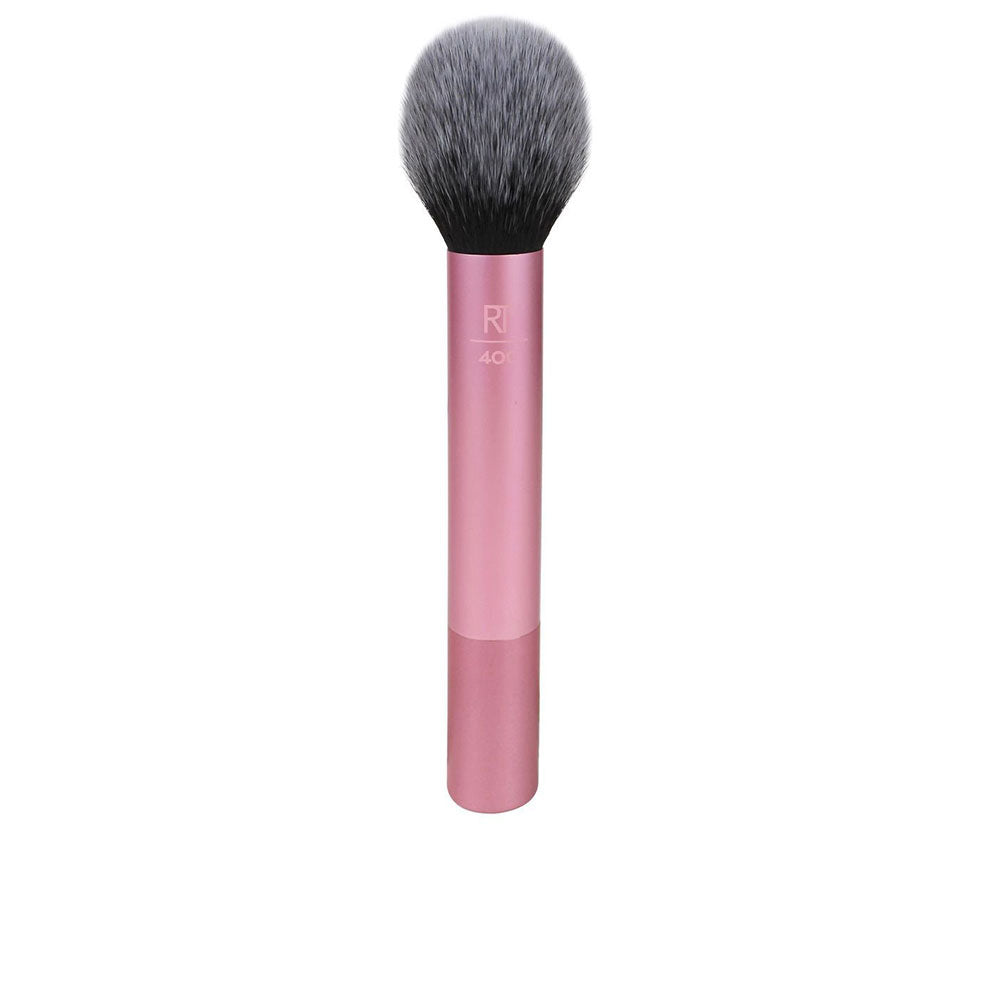 Rounded synthetic blush brush with dense UltraPlush fibres, ideal for powder and cream.