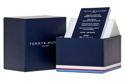 Tommy Hilfiger rose gold chronograph watch with white dial and brown leather strap on neutral background